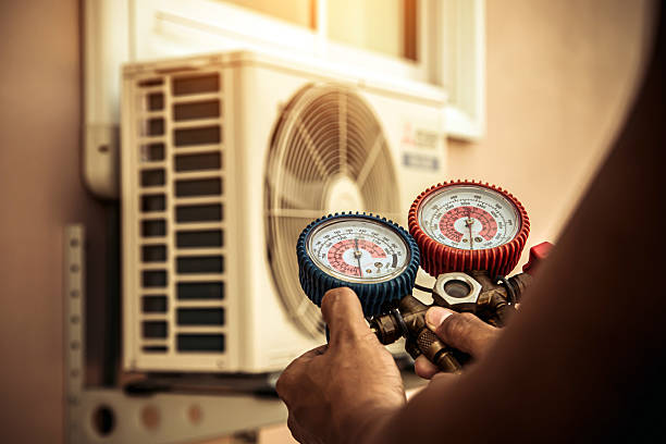 Professional Hvac technician working in Rushville, IN